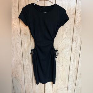 Black ribbed mini dress with side cut outs, size small